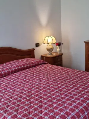 Letto o letti in una camera di LE BETULLE B&B