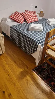 Letto o letti in una camera di LE BETULLE B&B