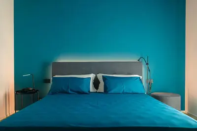 Letto o letti in una camera di Camoma Aparthotel - Suites Apartments
