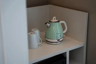 Set per la preparazione di tè e caffè presso BASALTO Venice Mestre Apartments