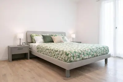 Letto o letti in una camera di Ca' Martha - A due passi dal centro con parcheggio privato