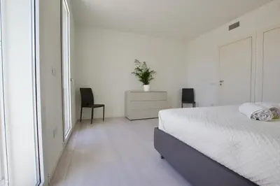 Letto o letti in una camera di Wave Resort - Home Immobiliare