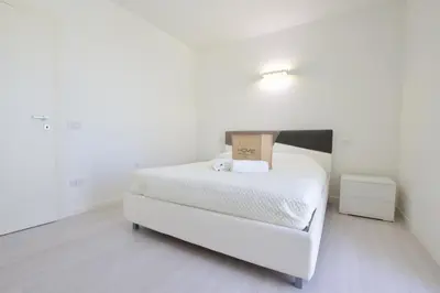 Letto o letti in una camera di Wave Resort - Home Immobiliare