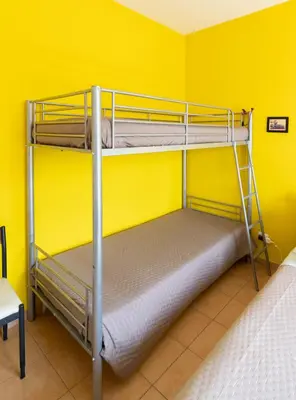 Letto o letti in una camera di SUN House