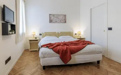 Letto o letti in una camera di Villa Luccon - Mirano Centro Storico
