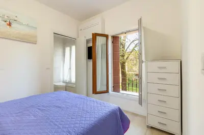 Letto o letti in una camera di Mussato Romantic River Flat x2 - con vista sul fiume