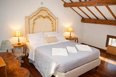 Letto o letti in una camera di HT - Casa del Poeta nel cuore di Padova