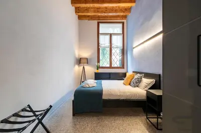 Letto o letti in una camera di Duomo5 Flat - Vicenza Centro Storico