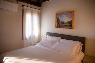 Letto o letti in una camera di Ca' Rino - Flats in Venice