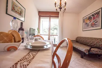 Area soggiorno di Seaside happiness flat and shared pool in Rosolina