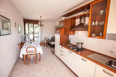 Cucina o angolo cottura di Seaside happiness flat and shared pool in Rosolina