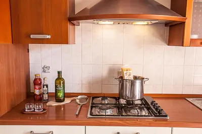 Cucina o angolo cottura di Seaside happiness flat and shared pool in Rosolina