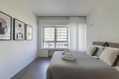 Letto o letti in una camera di Le Barche66 Venice Apartments