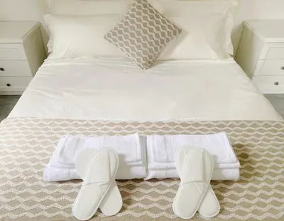 Letto o letti in una camera di Gris Apartment: Venice Mestre