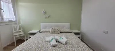 Letto o letti in una camera di Residenza Ca' Margherita Noale Venezia