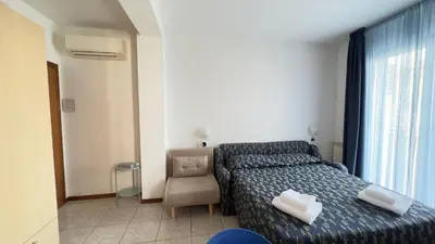 Letto o letti in una camera di Le Due Farfalle by Ca-Sa Check