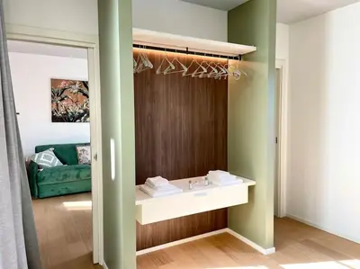 Letto o letti in una camera di Locatelli Apartments - Patio living 