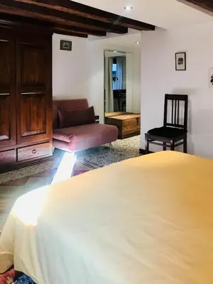 Letto o letti in una camera di Remedio - LOCAPPART
