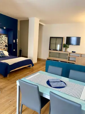 Letto o letti in una camera di Blue Suite