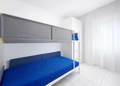 Letto o letti in una camera di Appartamento Shopping Center - Carraro Immobiliare - Family Apartments