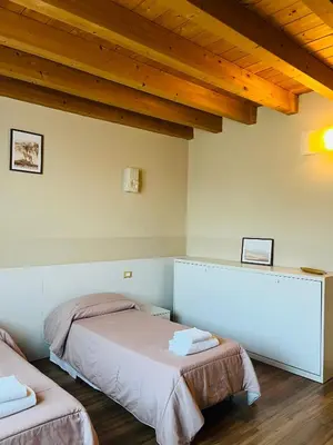 Letto o letti in una camera di Locanda Munerato