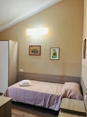 Letto o letti in una camera di Locanda Munerato