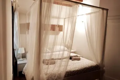 Letto o letti in una camera di Miracoli