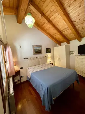 Letto o letti in una camera di La casa nel parco