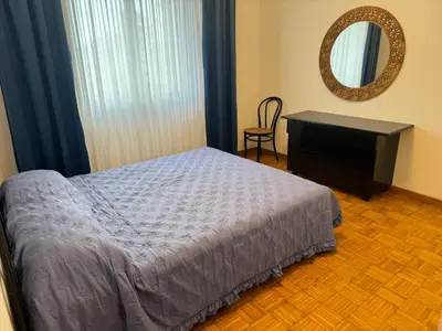 Letto o letti in una camera di Family App4rent Betulle 5 Jesolo