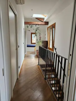Letto o letti in una camera di Casa Rossa vista canale