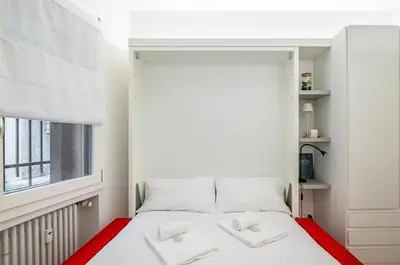 Letto o letti in una camera di GuestHost - Padova Central and Functional Studio!