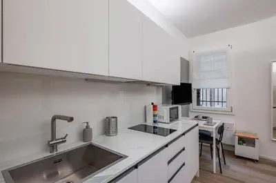 Cucina o angolo cottura di GuestHost - Padova Central and Functional Studio!
