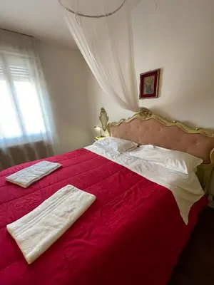 Letto o letti in una camera di Lovenice Center Royalclass