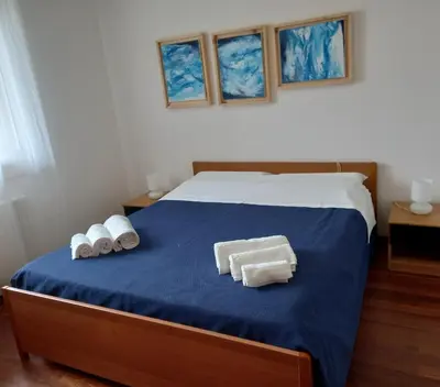 Letto o letti in una camera di Casa vacanze La Madonnetta