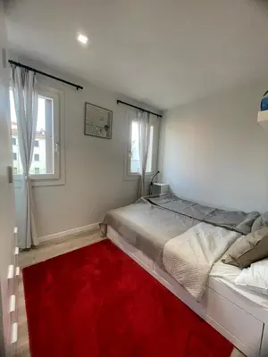 Letto o letti in una camera di Appartamento Ancora Chioggia