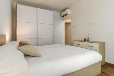 Letto o letti in una camera di LUME, Family Apartment
