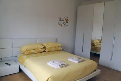 Letto o letti in una camera di Casa Sunholiday Venezia