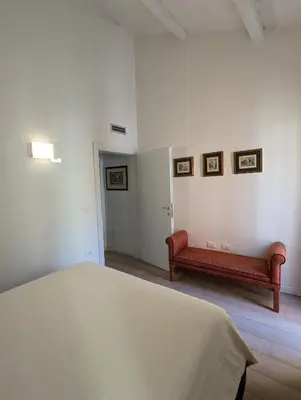 Letto o letti in una camera di Corte San Marco