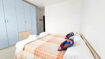 Letto o letti in una camera di Esperia Apartment by Ca-Sa Check