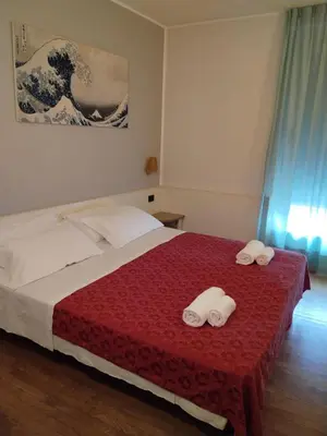 Letto o letti in una camera di Hotel Xibana