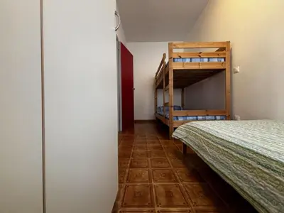 Letto o letti in una camera di Relax in our flat by the beach