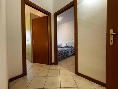 Letto o letti in una camera di Comfortable flat in Bibione-Beahost