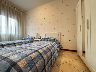 Letto o letti in una camera di Comfortable flat in Bibione-Beahost