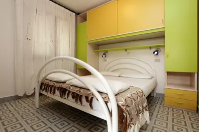 Letto o letti in una camera di Villa Chiara