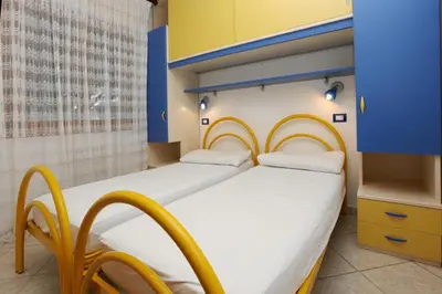 Letto o letti in una camera di Villa Zanella