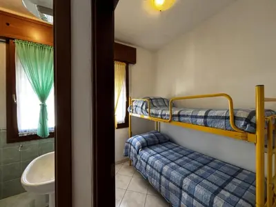 Letto o letti in una camera di Renovated apartment in Rosolina