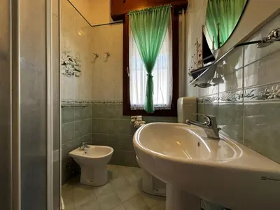 Bagno di Renovated apartment in Rosolina
