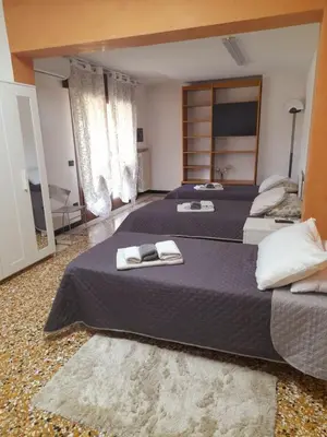 Letto o letti in una camera di Sweet House