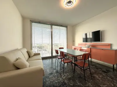TV o dispositivi per l'intrattenimento presso Condominio Marinella - Carraro Immobiliare - Family Apartments