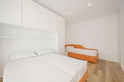 Letto o letti in una camera di Wave Island Sange C4